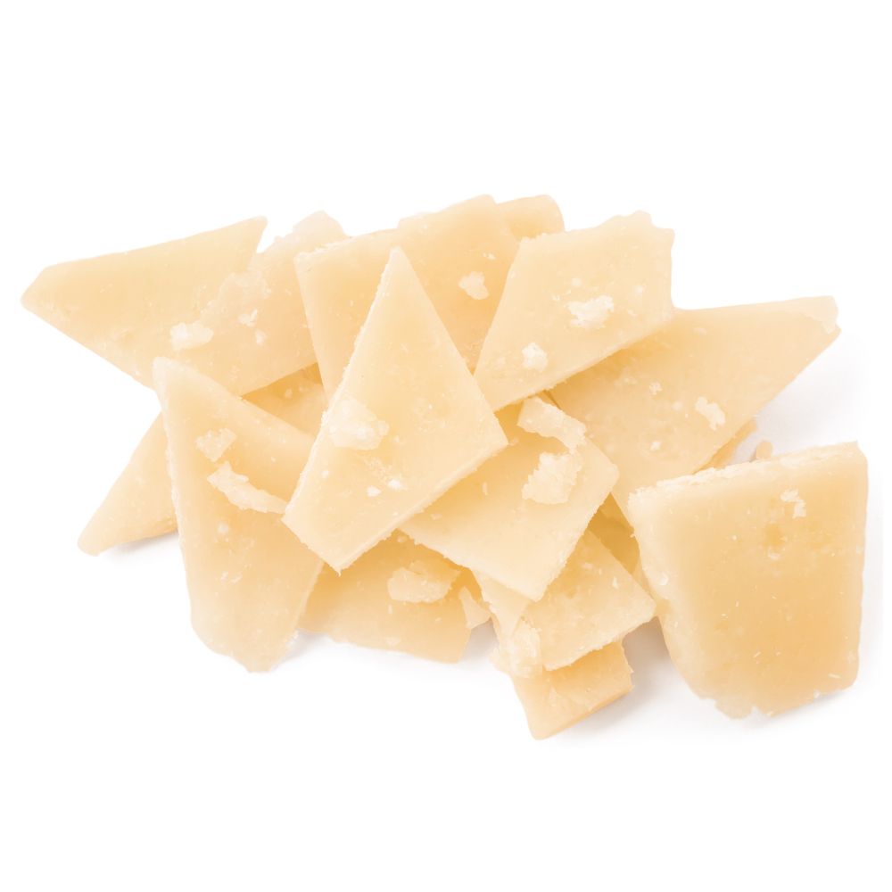 A pile of assorted cheese cubes arranged on a clean white background.